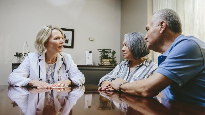 Couple Talking with Doctor