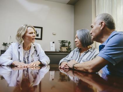 Couple Talking with Doctor