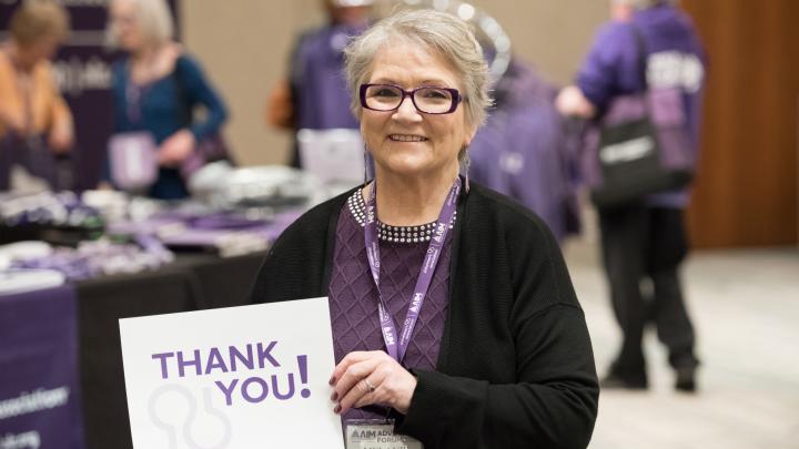 White Woman with Thank You Sign