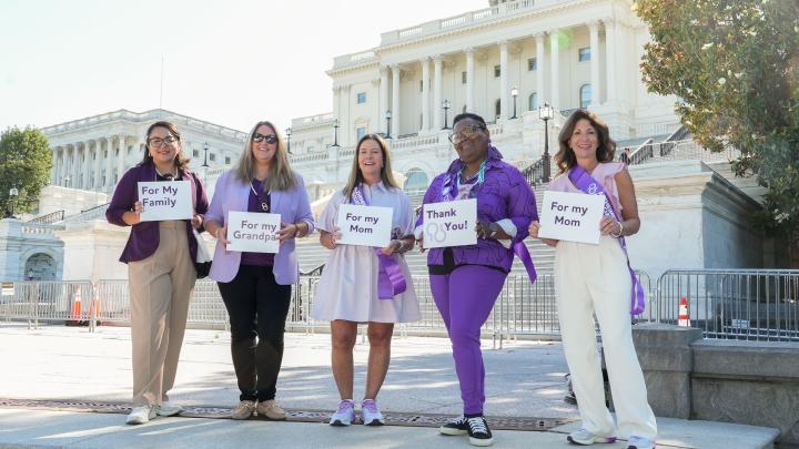 advocates behind capitol